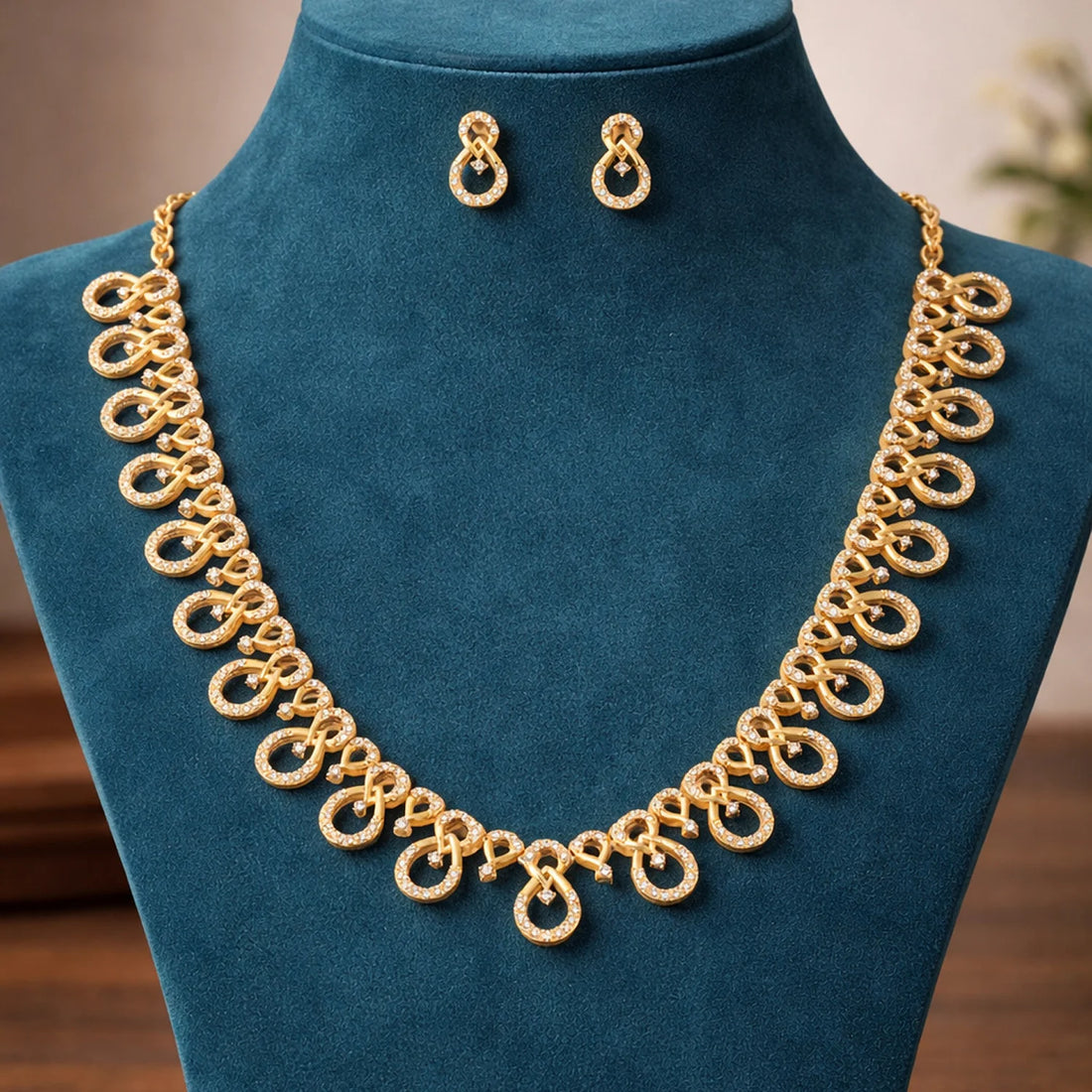 Infinity Design Gold Plated American Diamond Necklace Set