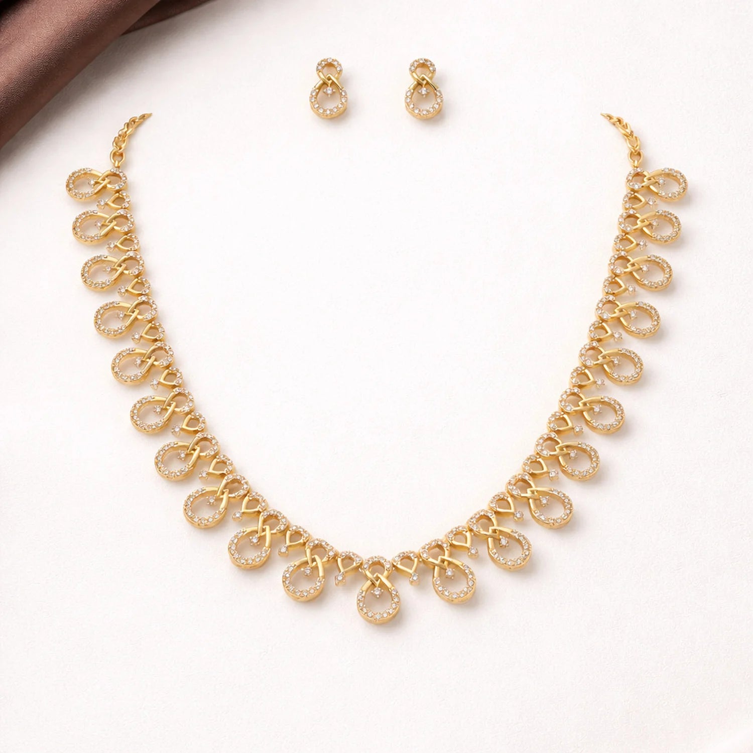 Infinity Design Gold Plated American Diamond Necklace Set