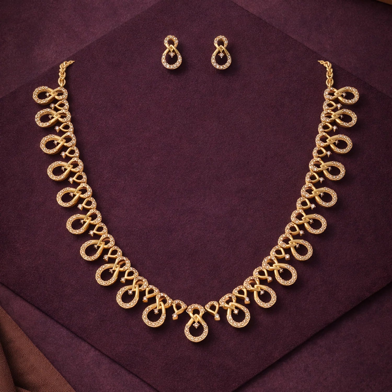 Infinity Design Gold Plated American Diamond Necklace Set