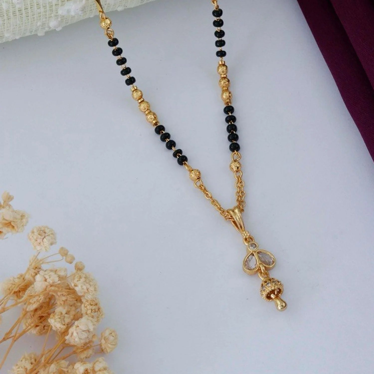 Stylish Black Beads Gold Finish Mangalsutra