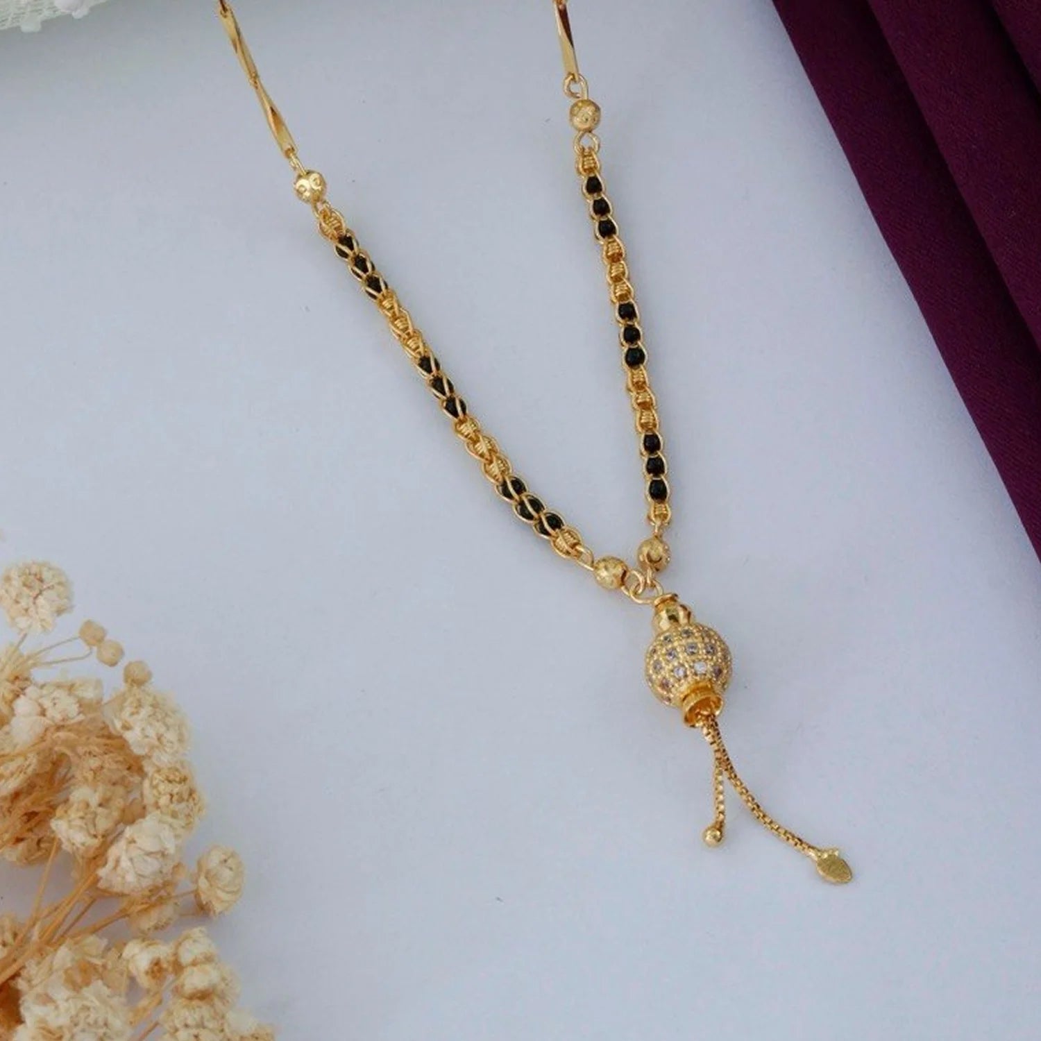 Elegant Gold Plated Black Beads Mangalsutra with Stone Pendant