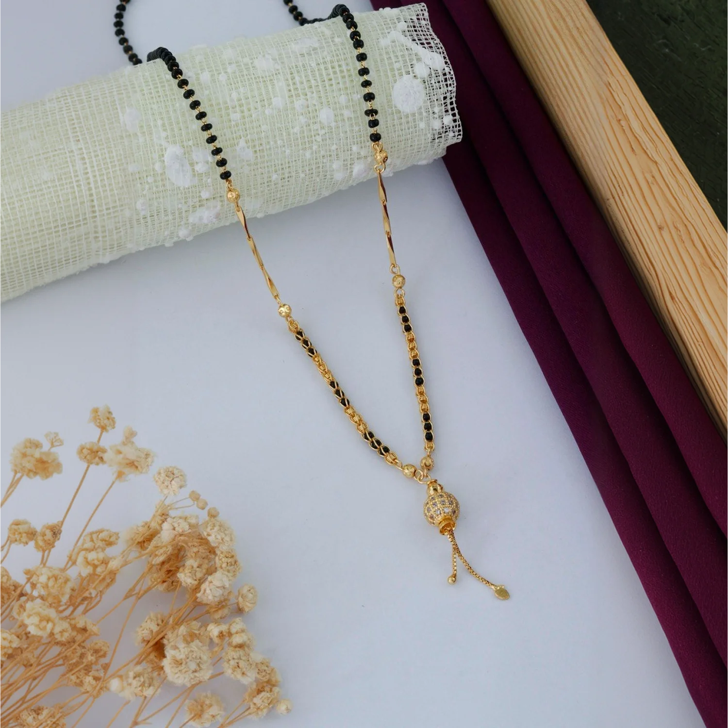 Elegant Gold Plated Black Beads Mangalsutra with Stone Pendant